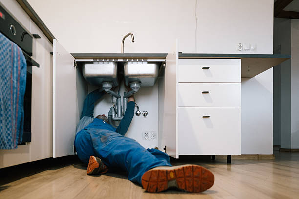Professional Drain Cleaning technician working in Carroll, IA